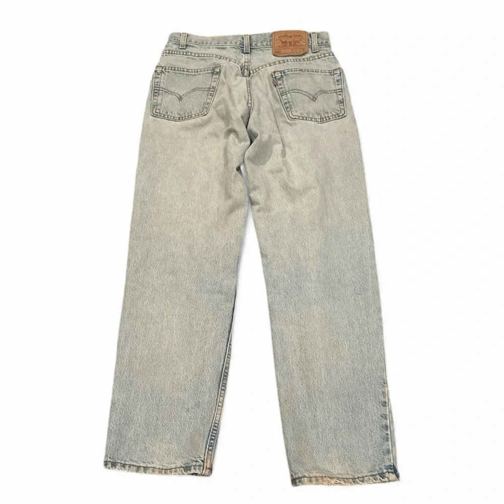 Vintage Levi's Men's Light Blue 550 Relaxed Straight Jeans 31/30
